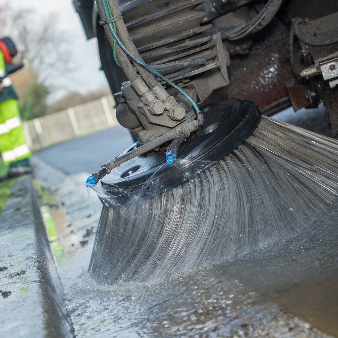 Closeup of road sweeper brush